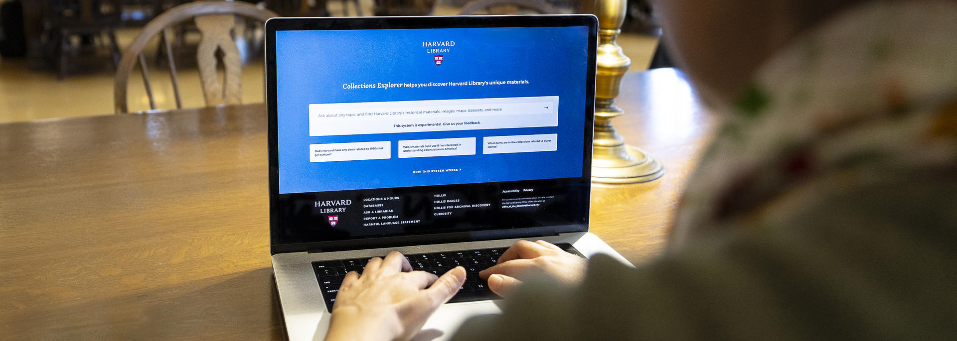 A person views the Collections Explorer on a laptop.